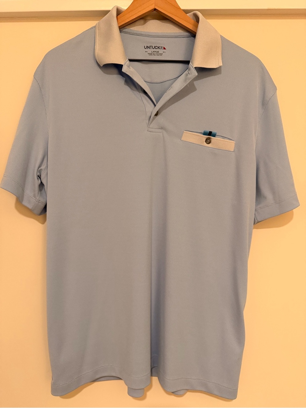 UNTUCKit Light Blue Polo with Cream Collar and Pocket Trim